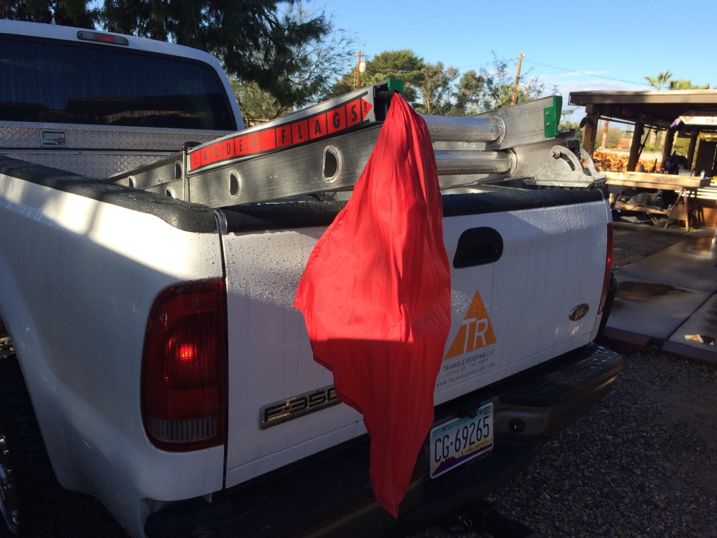 Triangle Roofing Company's ladders are DOT OSHA Compliant and displayed ion there vehicles.